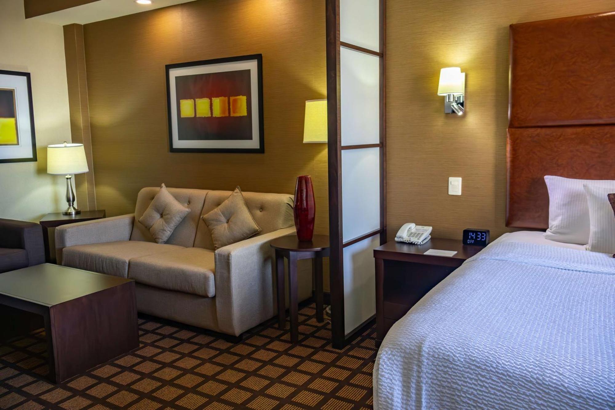 Best Western Premier Monterrey Aeropuerto Apodaca Exterior photo A typical hotel room at the Residence Inn