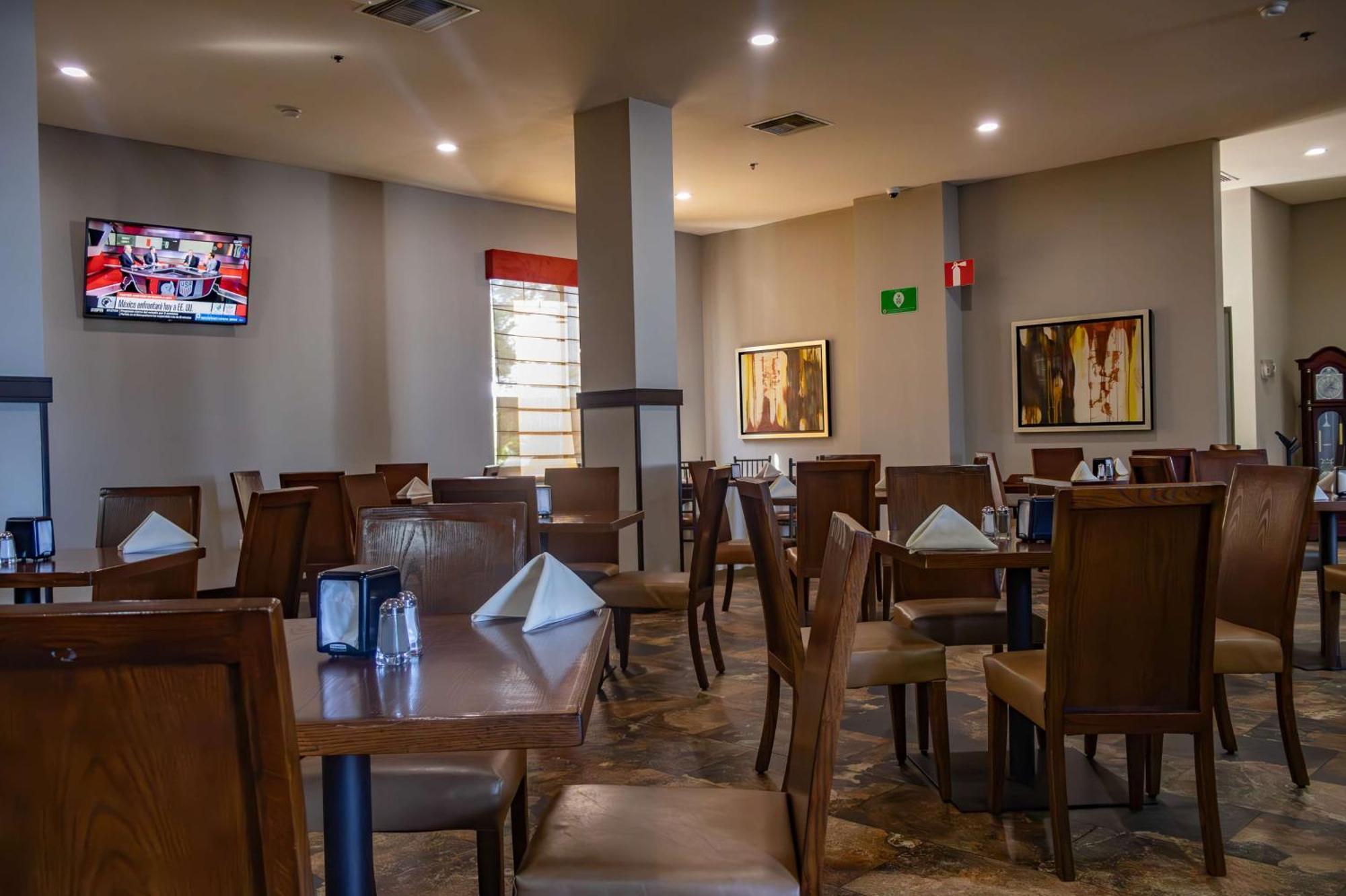 Best Western Premier Monterrey Aeropuerto Apodaca Exterior photo The dining room at the restaurant